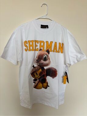 drew house White Tee with Yellow SHERMAN Logo and Squirrel Graphic